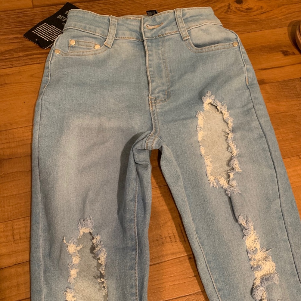 Light wash distressed jeans